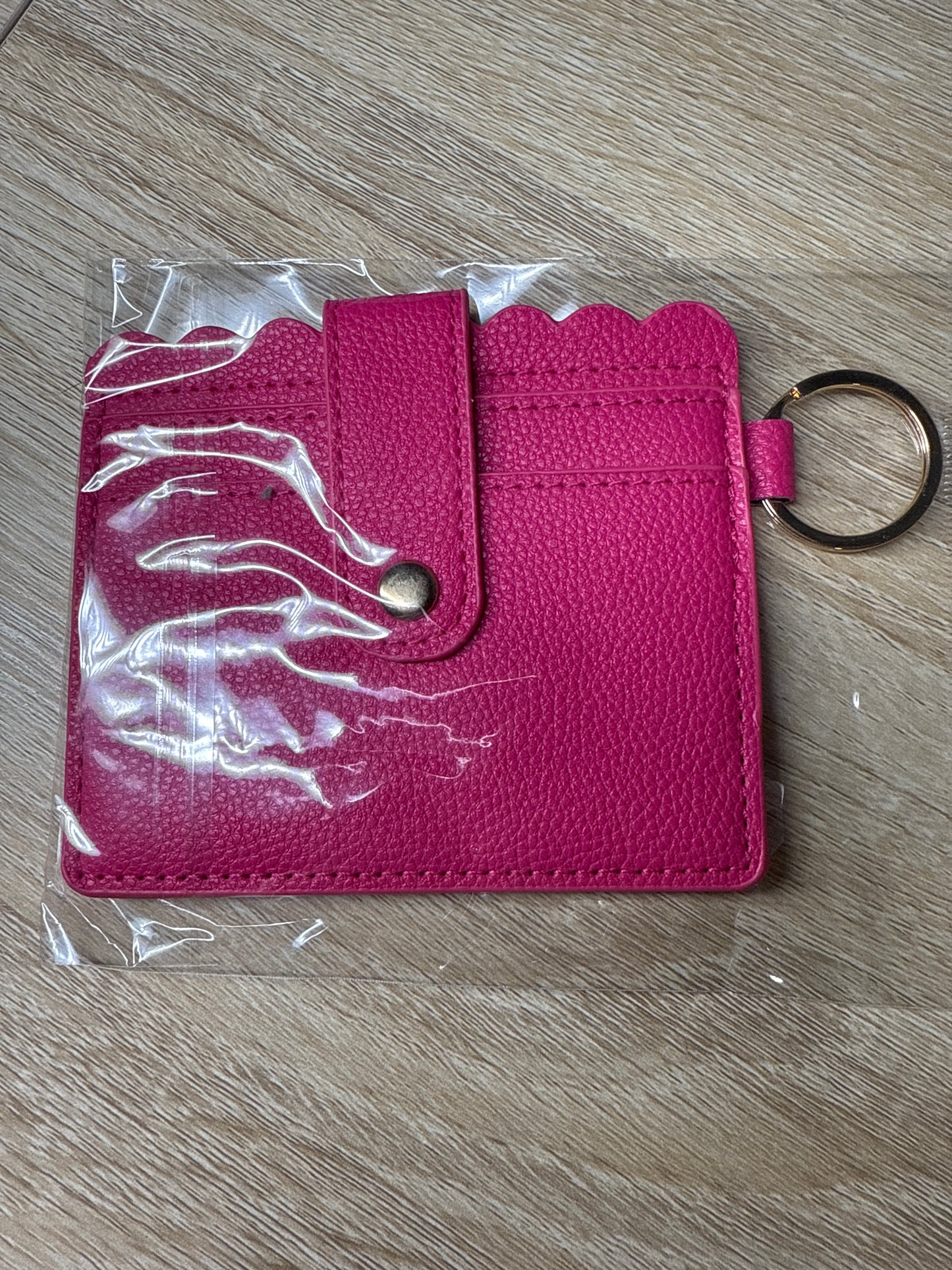 Cartera para tarjetas rosa intenso con herrajes dorados