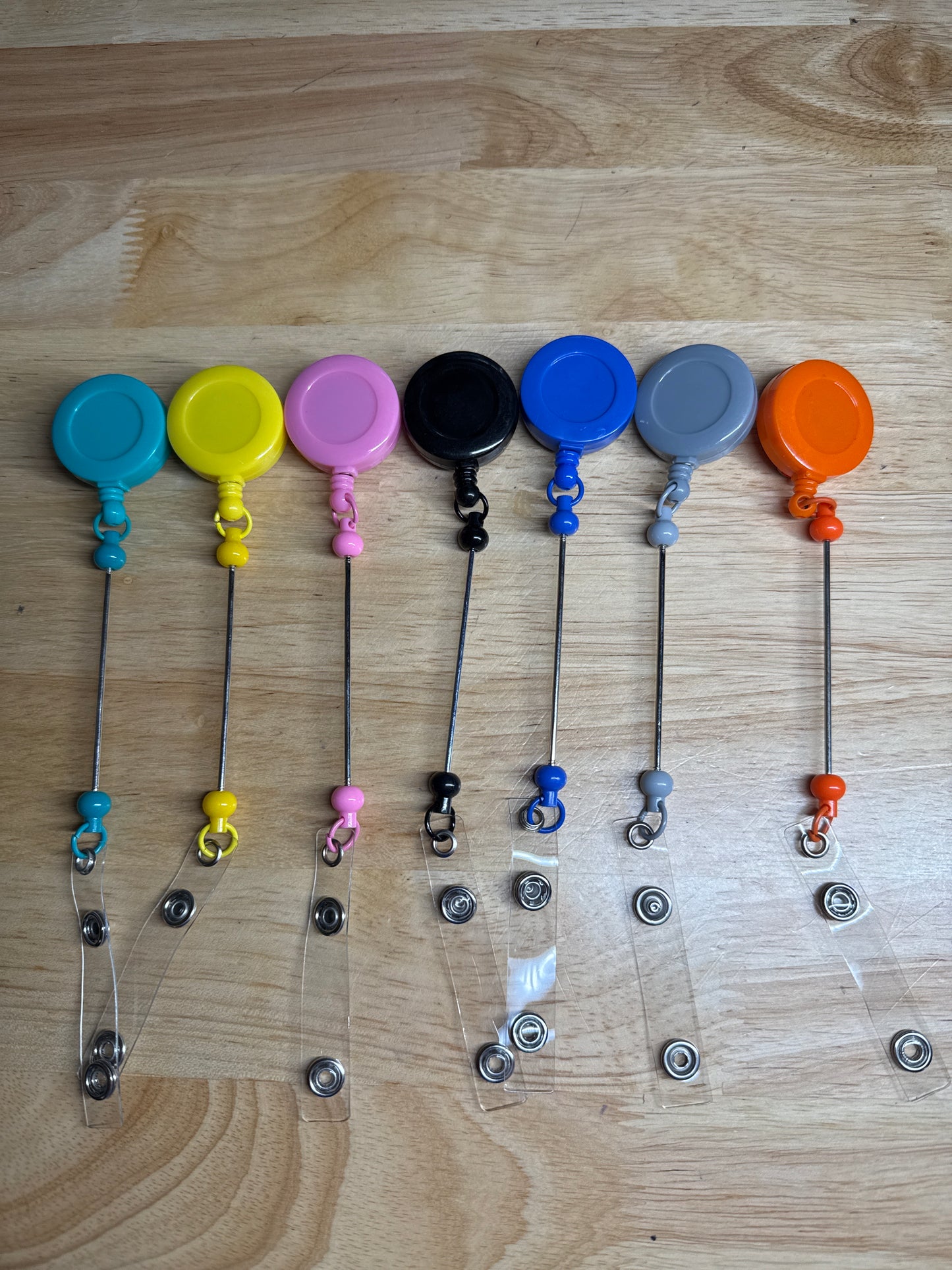 Carretes de insignia con barra de cuentas extendida