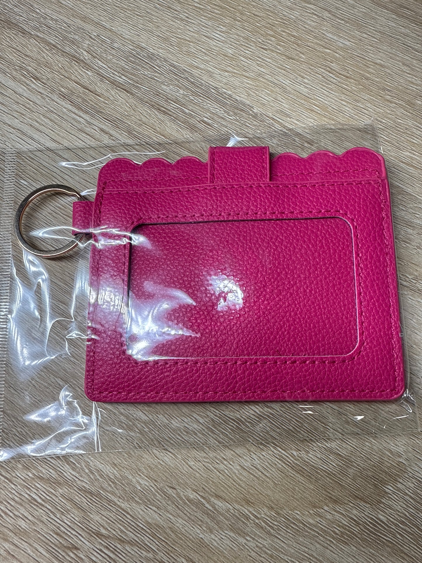 Cartera para tarjetas rosa intenso con herrajes dorados