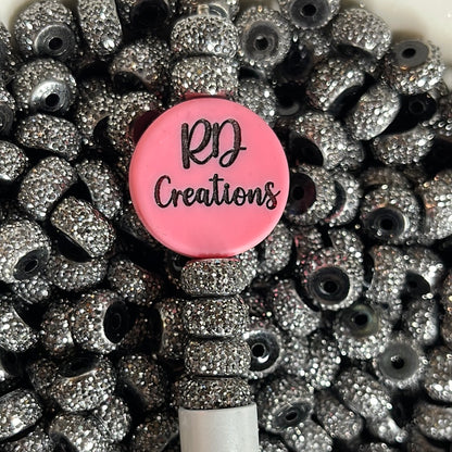 Paquete de 10 cuentas espaciadoras brillantes de plata negra de 12 mm