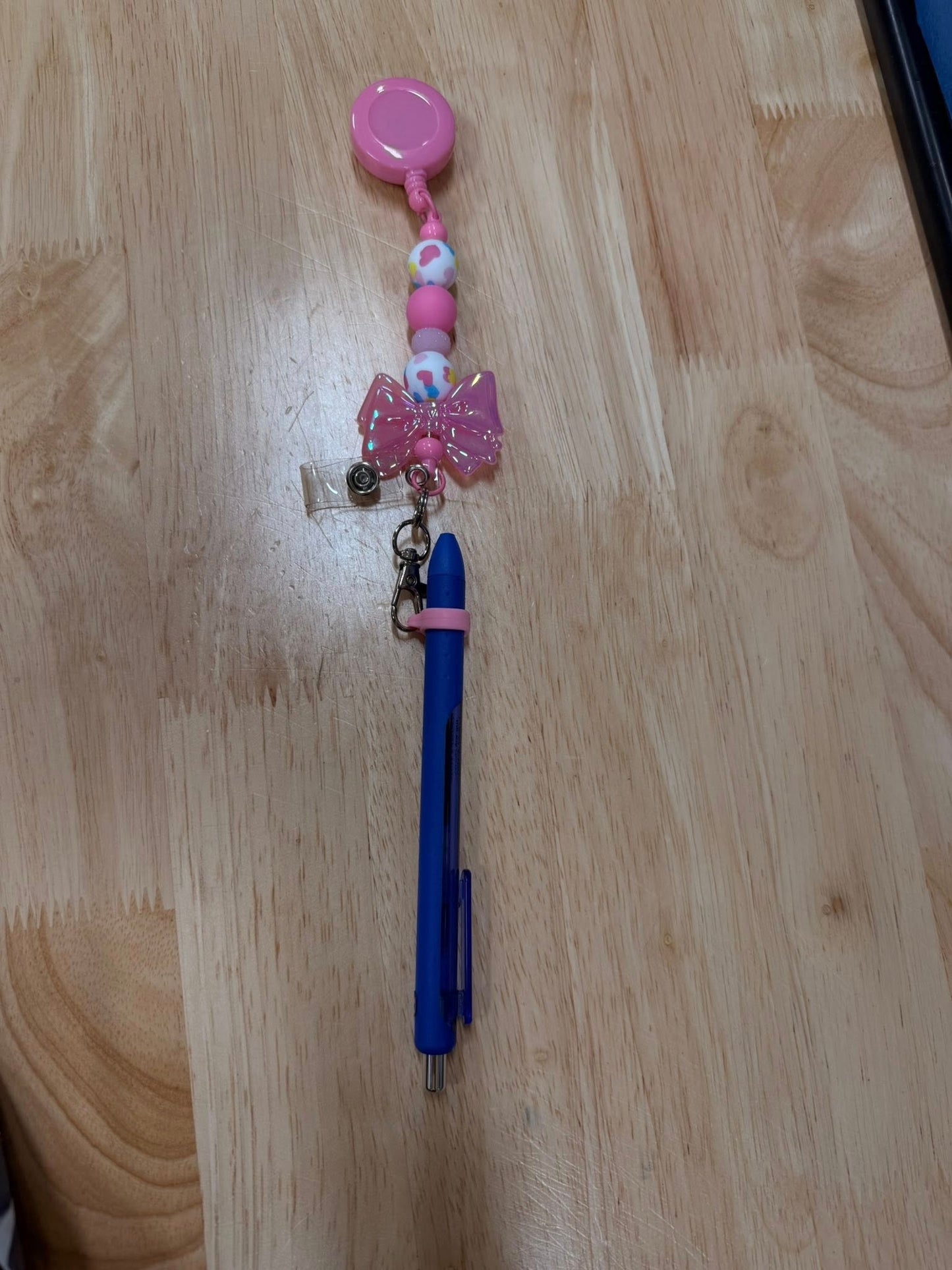 Silicone pen grip for badge reels/lanyards