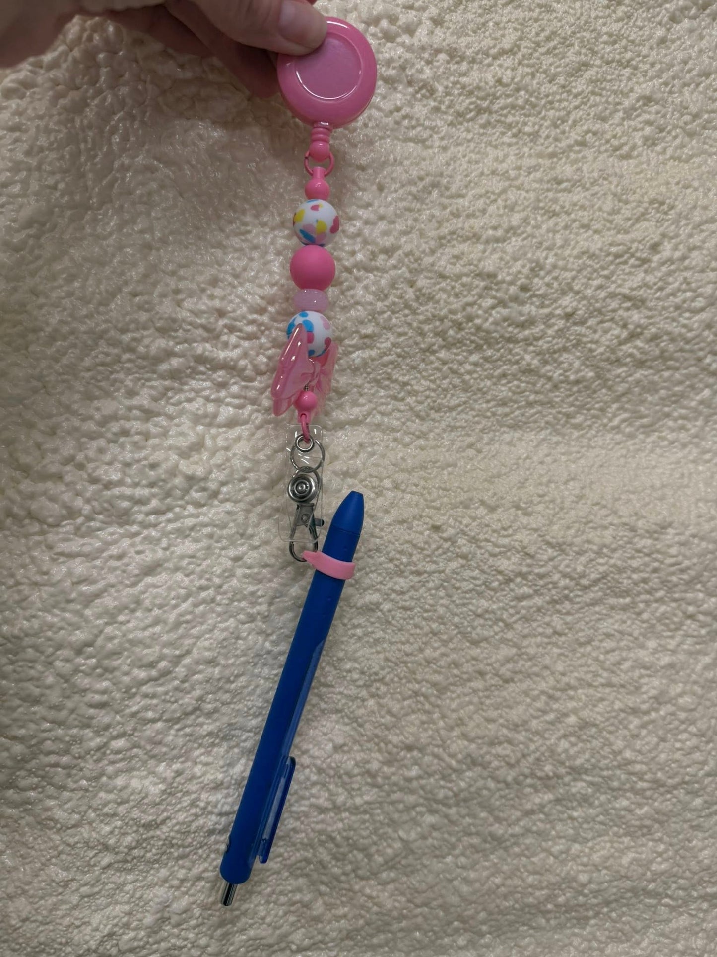 Silicone pen grip for badge reels/lanyards