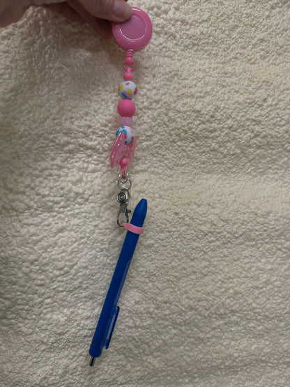 Silicone pen grip for badge reels/lanyards