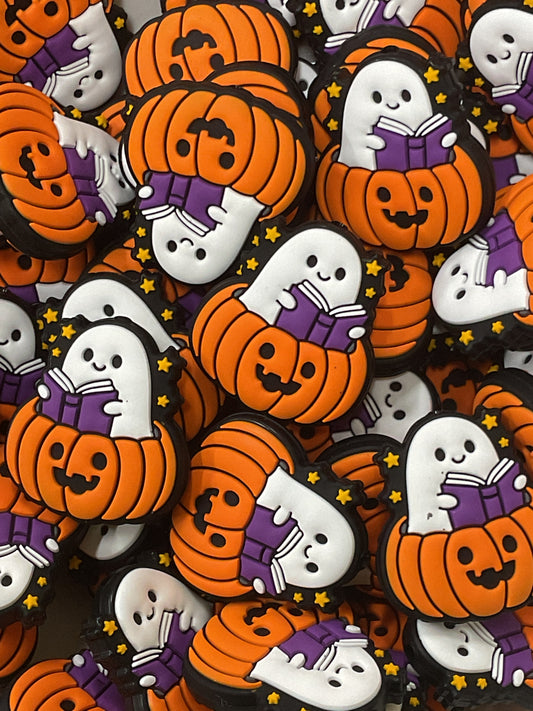 Ghost Reading Book in Pumpkin